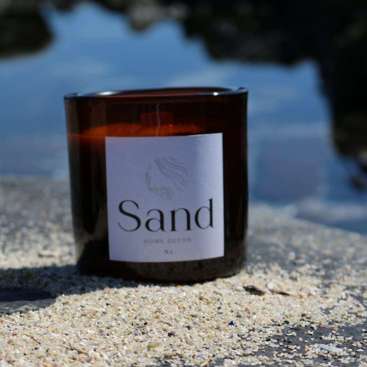 Luxury large handmade soy scented candle in an amber glass jar. 