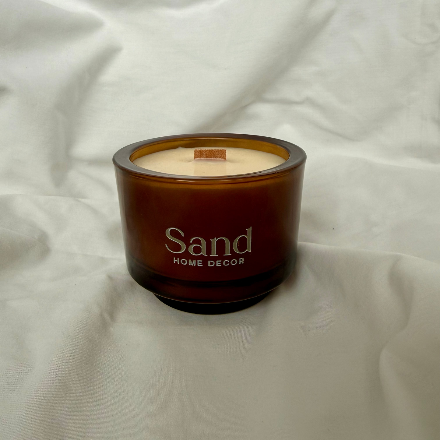 Handmade amber glass soy candle with wooden wick, luxury home decor by Sand Home Decor in Cape Town. 
